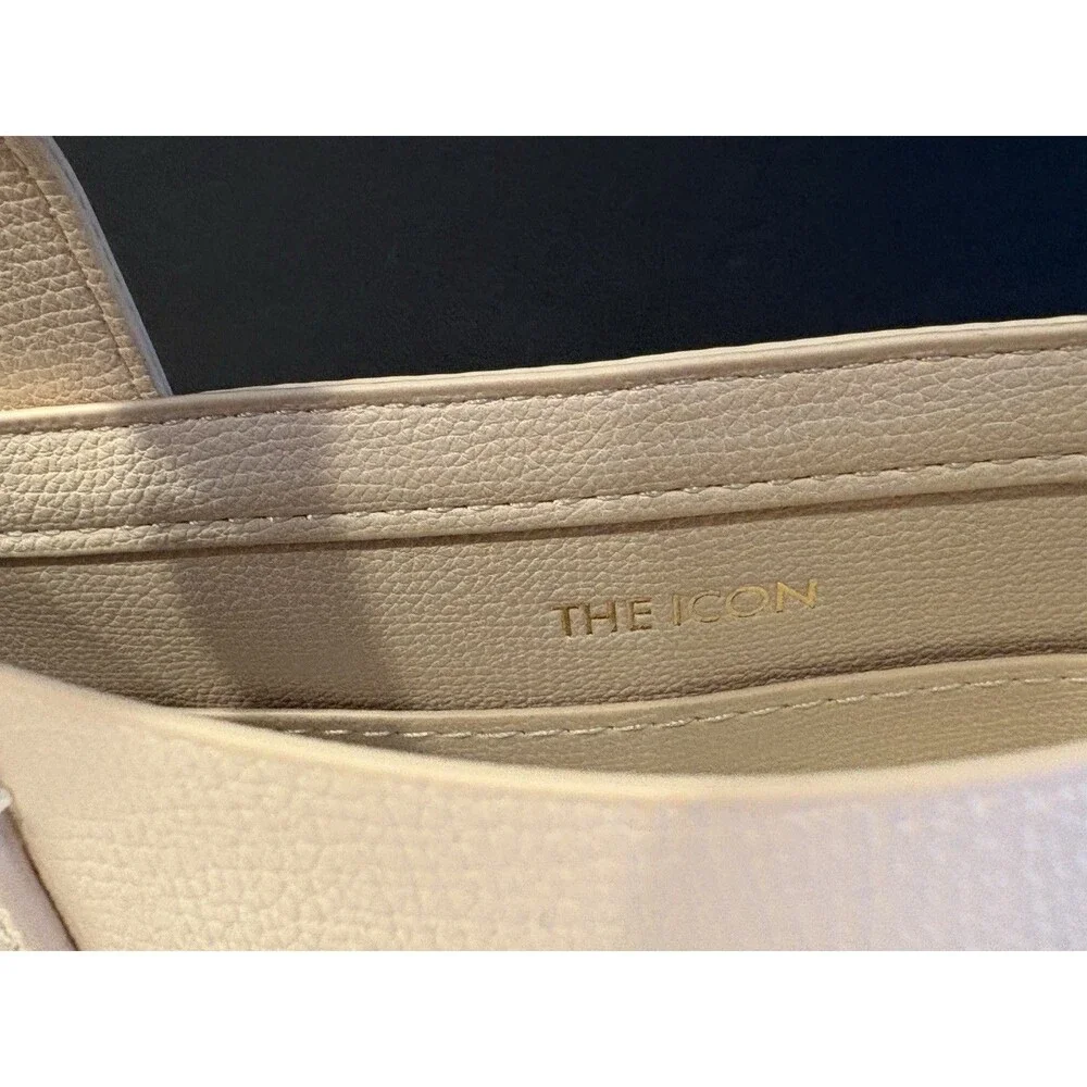 Ted Baker Icon small tote bag in a cream-colored, structured material.